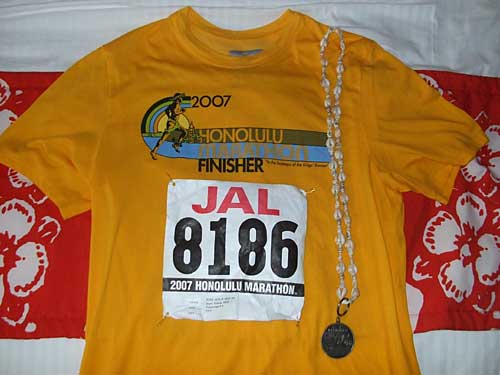 finisher's shirt with medal and bib