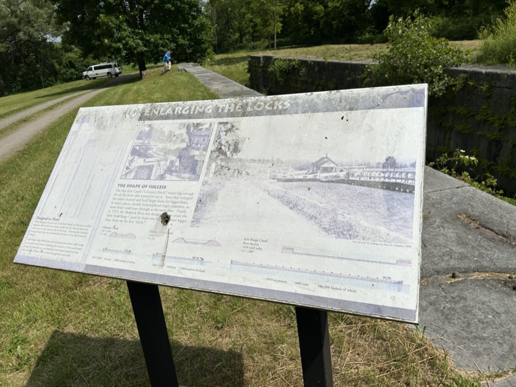 A faded and barely readable sign at old Erie Canal Lock 33